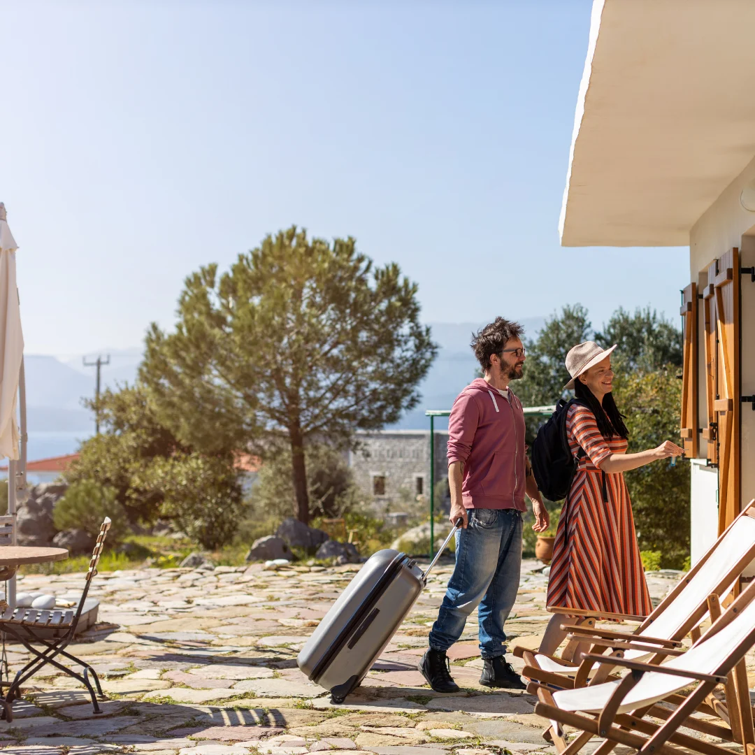 couple entering their rented Airbnb