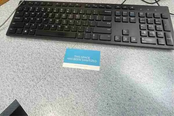 a card that says "this space has been sanitized"